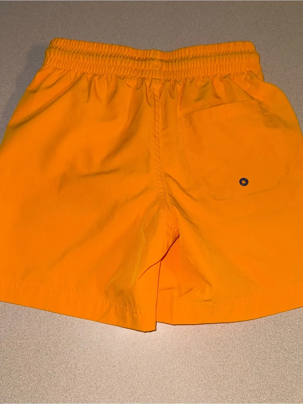 Old Navy boys size L 10-12 swim trunks yellowish orange with blue drawstring